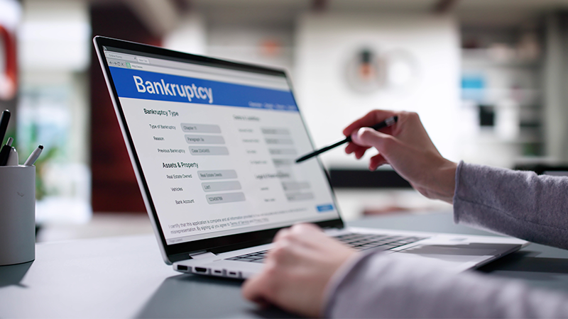 Computer with the word Bankruptcy on it