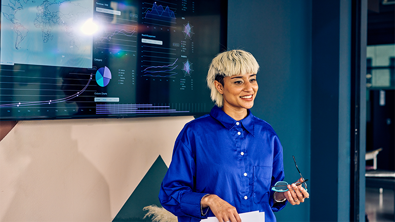 Woman presenting at a meeting