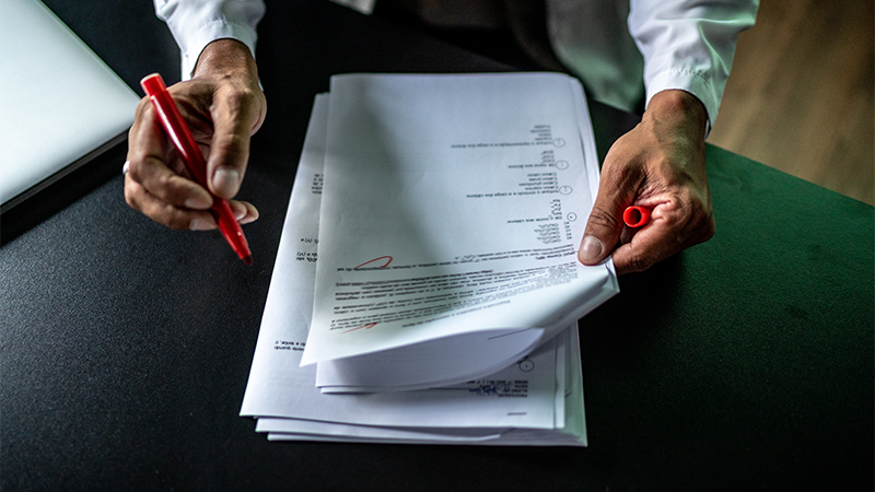 Hands with document