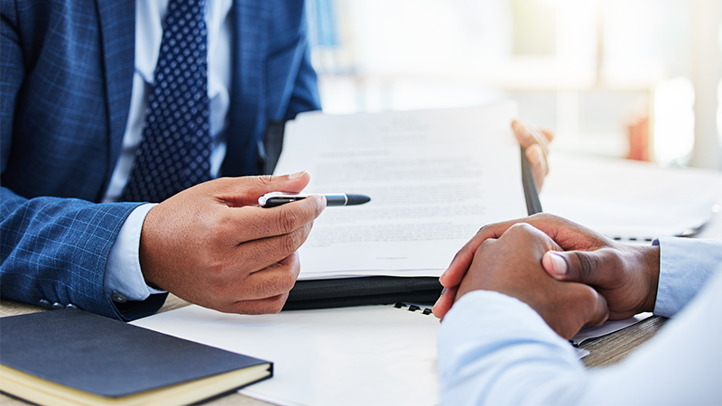 hands explaining documents